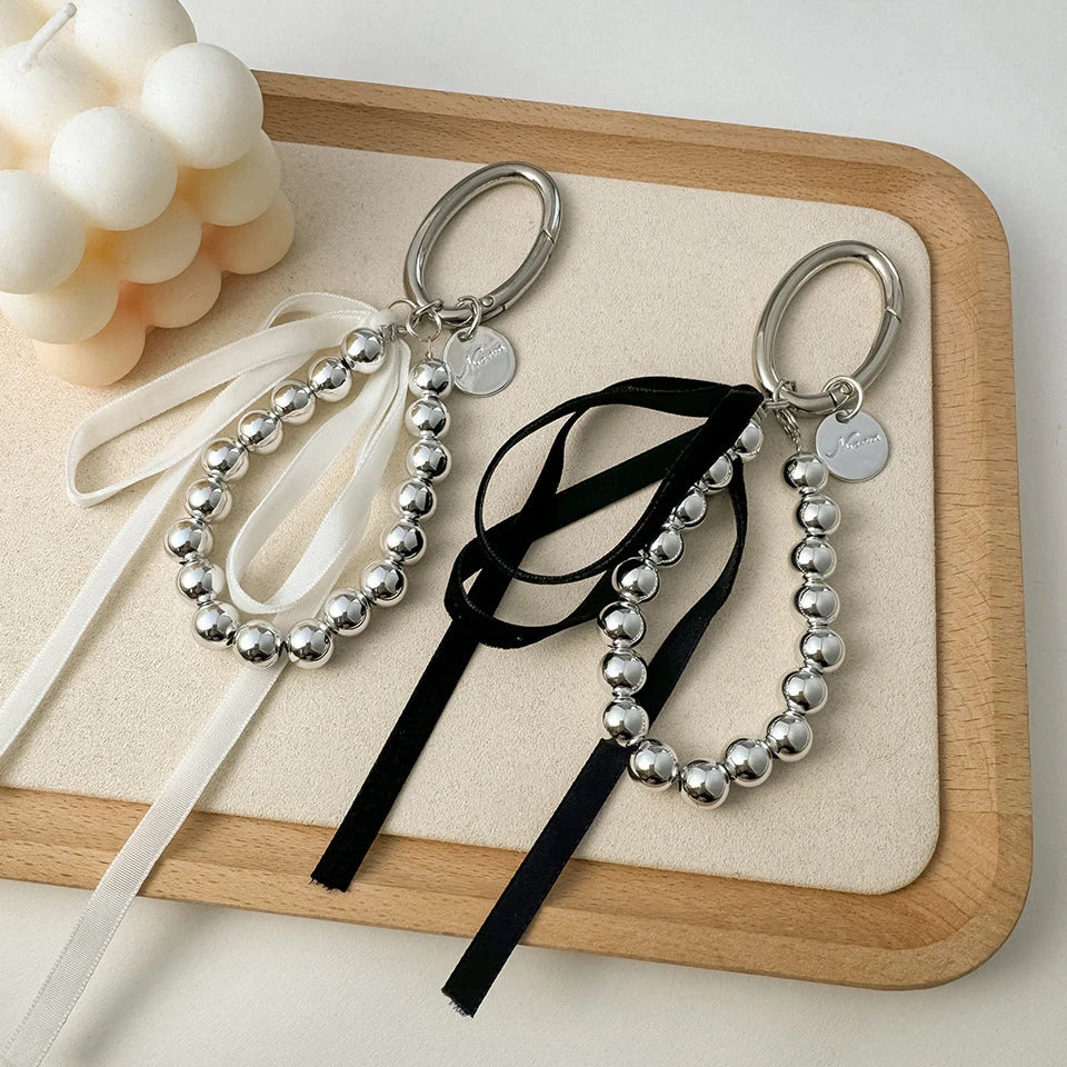 ZAKOL Elegant Pearls Ribbon Bowknot Bag Hanging Decoration Key Chain for Women Beads Key Rings Jewelry Girl Accessories