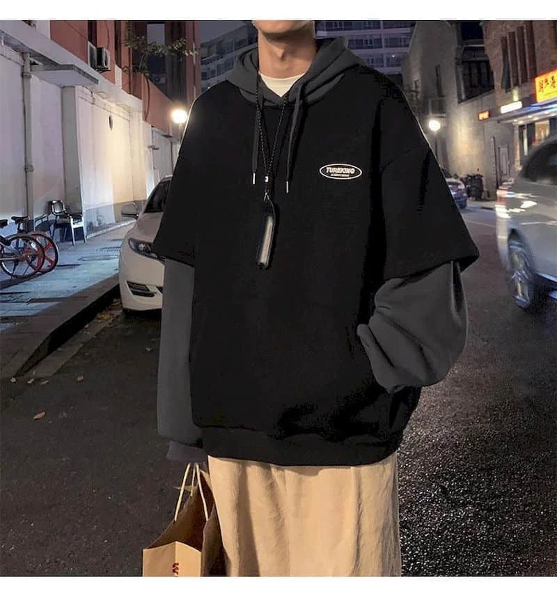 Hoodies men fake two-piece sweatshirt autumn stitching Korean loose contrast color hooded long-sleeved black white gray design