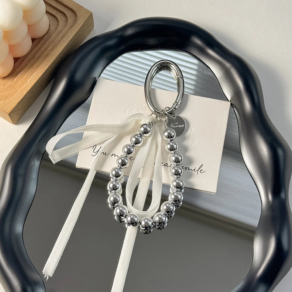 ZAKOL Elegant Pearls Ribbon Bowknot Bag Hanging Decoration Key Chain for Women Beads Key Rings Jewelry Girl Accessories