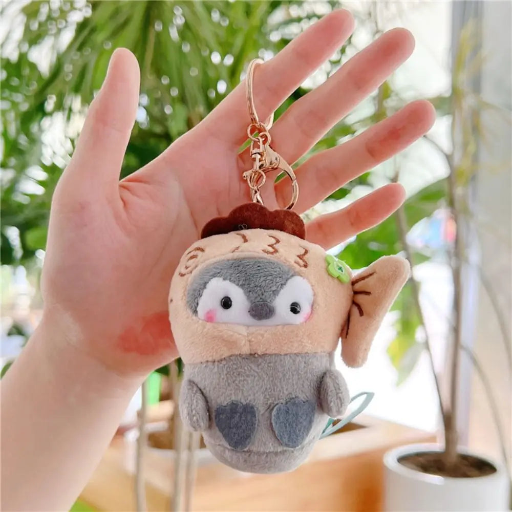 かわいいペンギンのぬいぐるみキーホルダー 観光帽子ペンギンキーホルダー 女の子へのギフト クリエイティブなスクールバッグキーホルダー