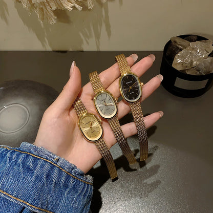 女性用ゴールド腕時計 ヴィンテージブレスレット腕時計 高級小型レディースオーバルクォーツ腕時計