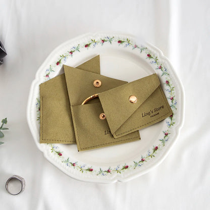 100Pcs Luxury Dark Green Microfiber Gold Snap Bag Envelope Button Purse Pouch For Ring Earrings Headset Coin Soap Gift Organizer