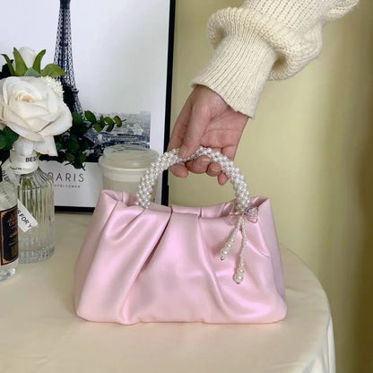 Elegant pink pleated pearl embellished clutch bag - magnetic closure, imitation leather, suitable for weddings and parties