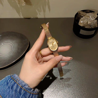 女性用ゴールド腕時計 ヴィンテージブレスレット腕時計 高級小型レディースオーバルクォーツ腕時計